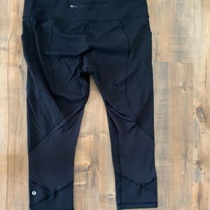 Cropped black Lululemon leggings.